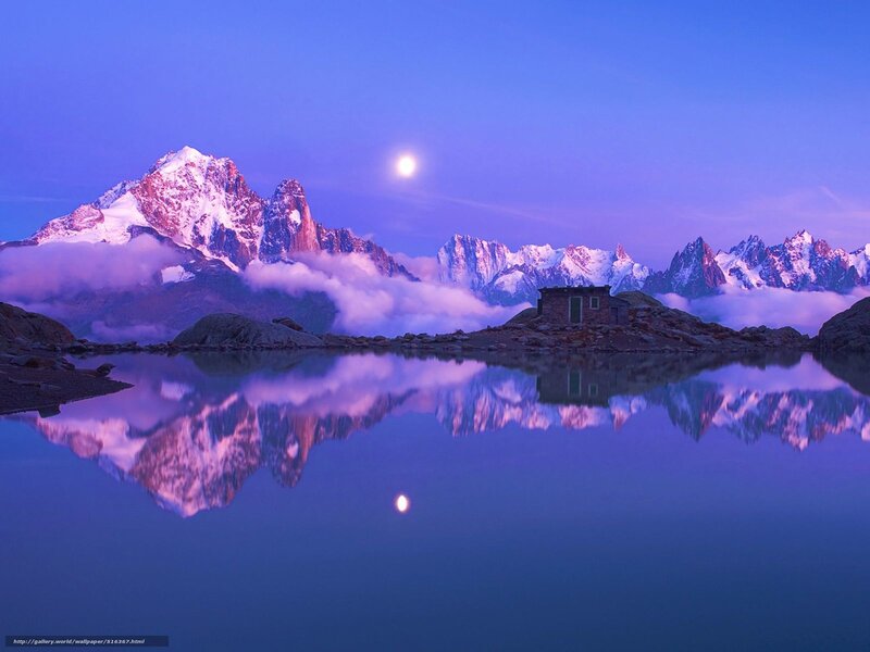 Moonlit mountain lake reflection