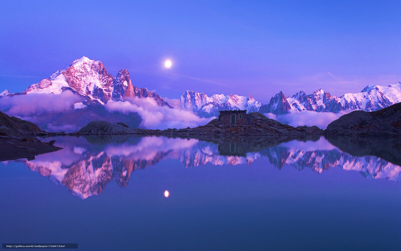 Moonlit mountain lake reflection