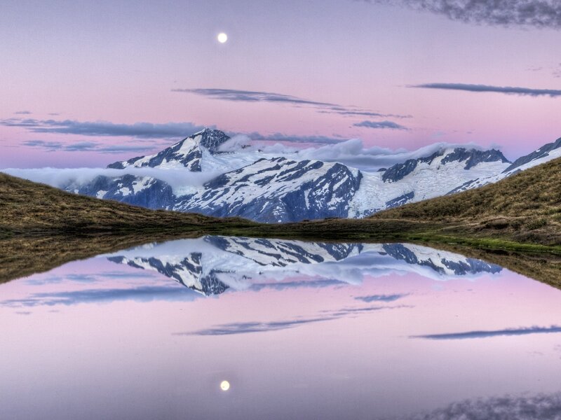 Moonlit mountain reflection