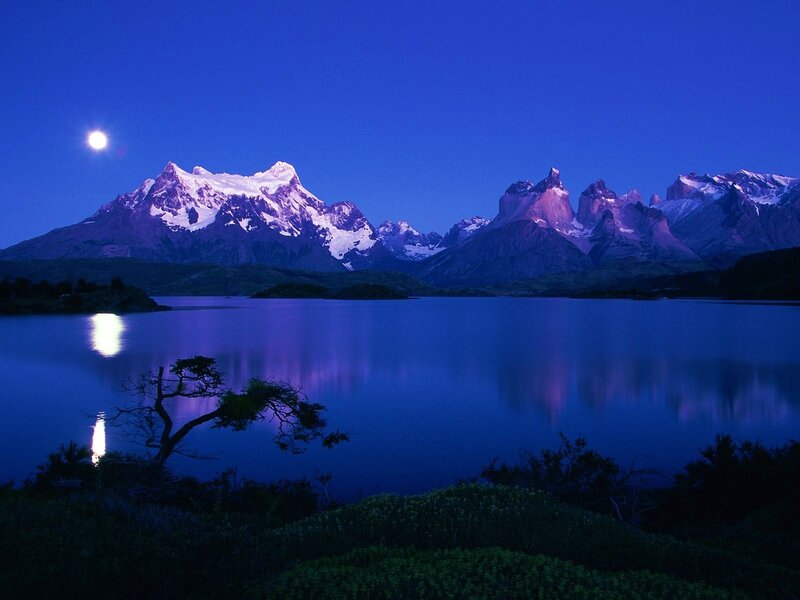 Moonlit mountains and lake