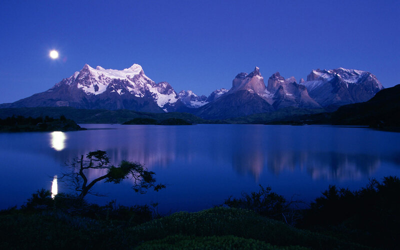 Moonlit mountains at night