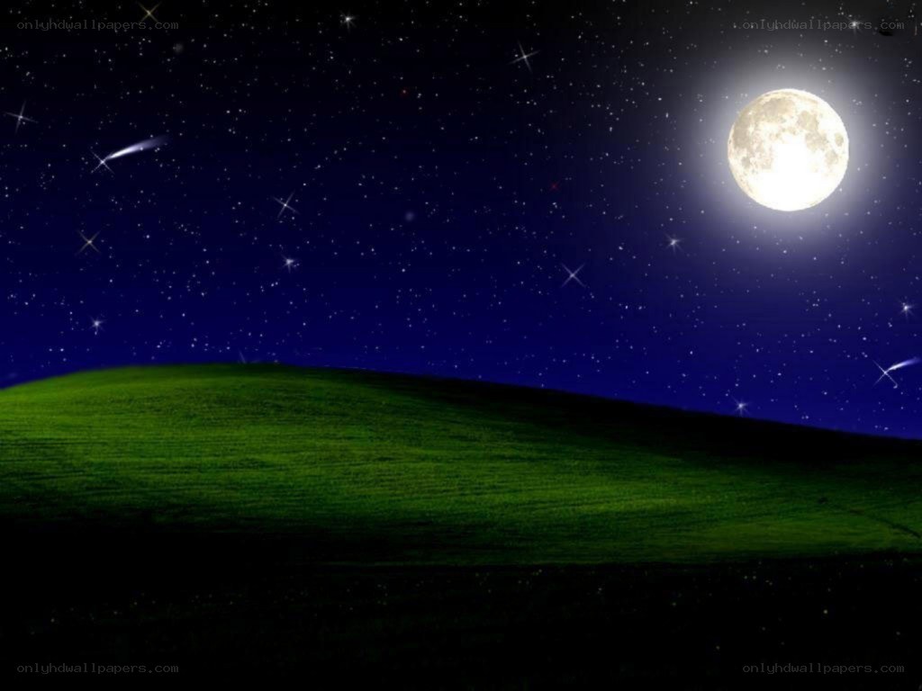 Moonlit night over green hills