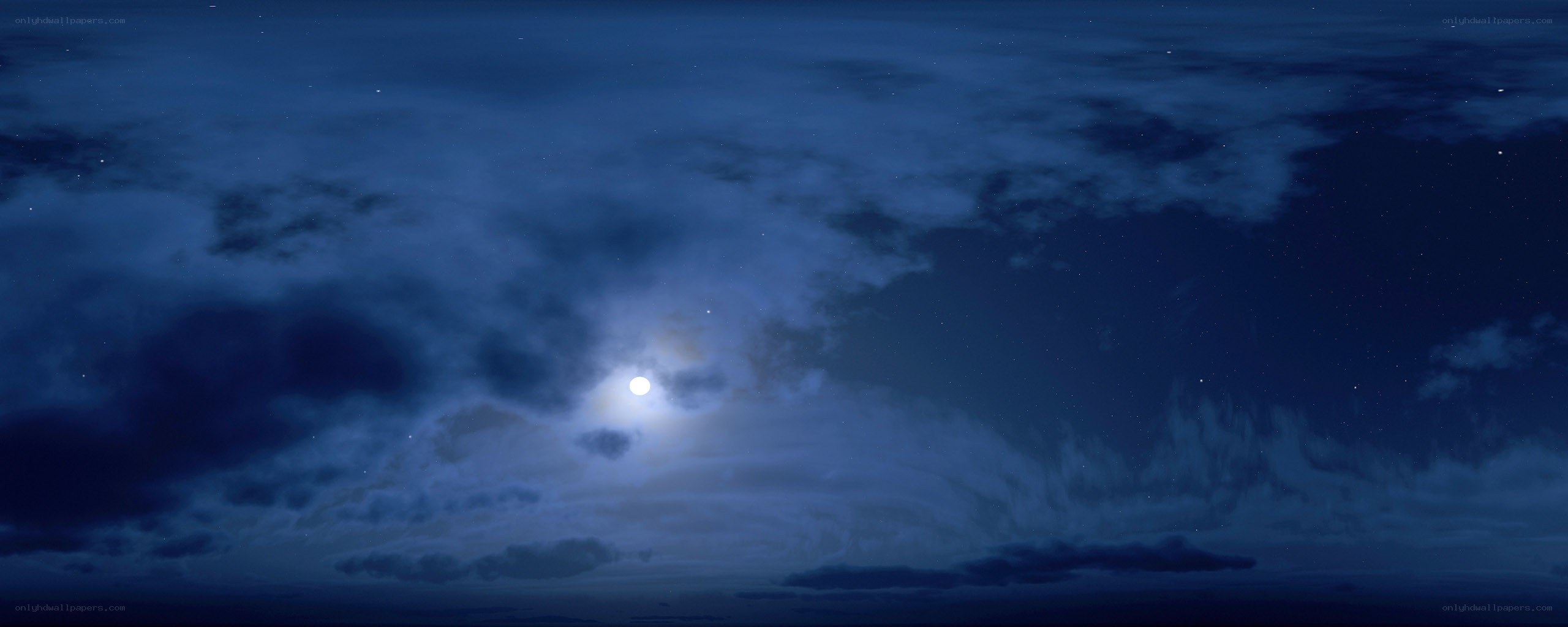 Moonlit night sky with clouds