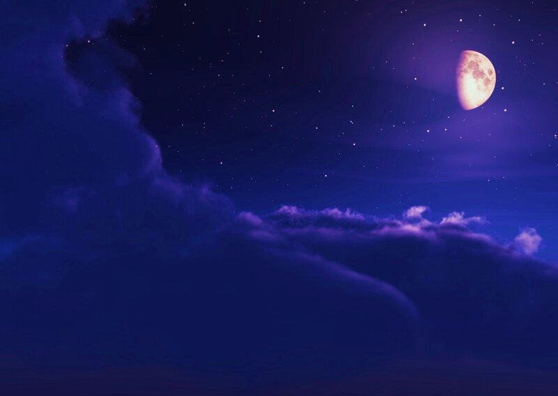 Moonlit night sky with clouds