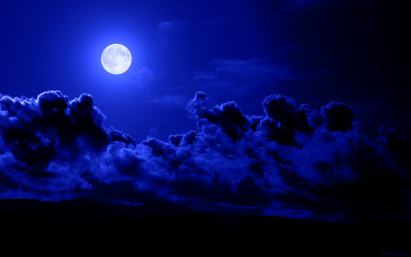 Moonlit night with clouds