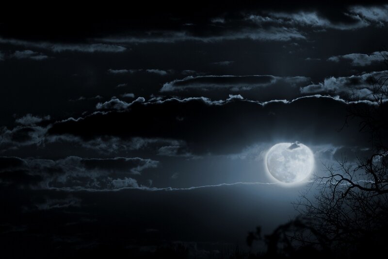 Moonlit night with clouds