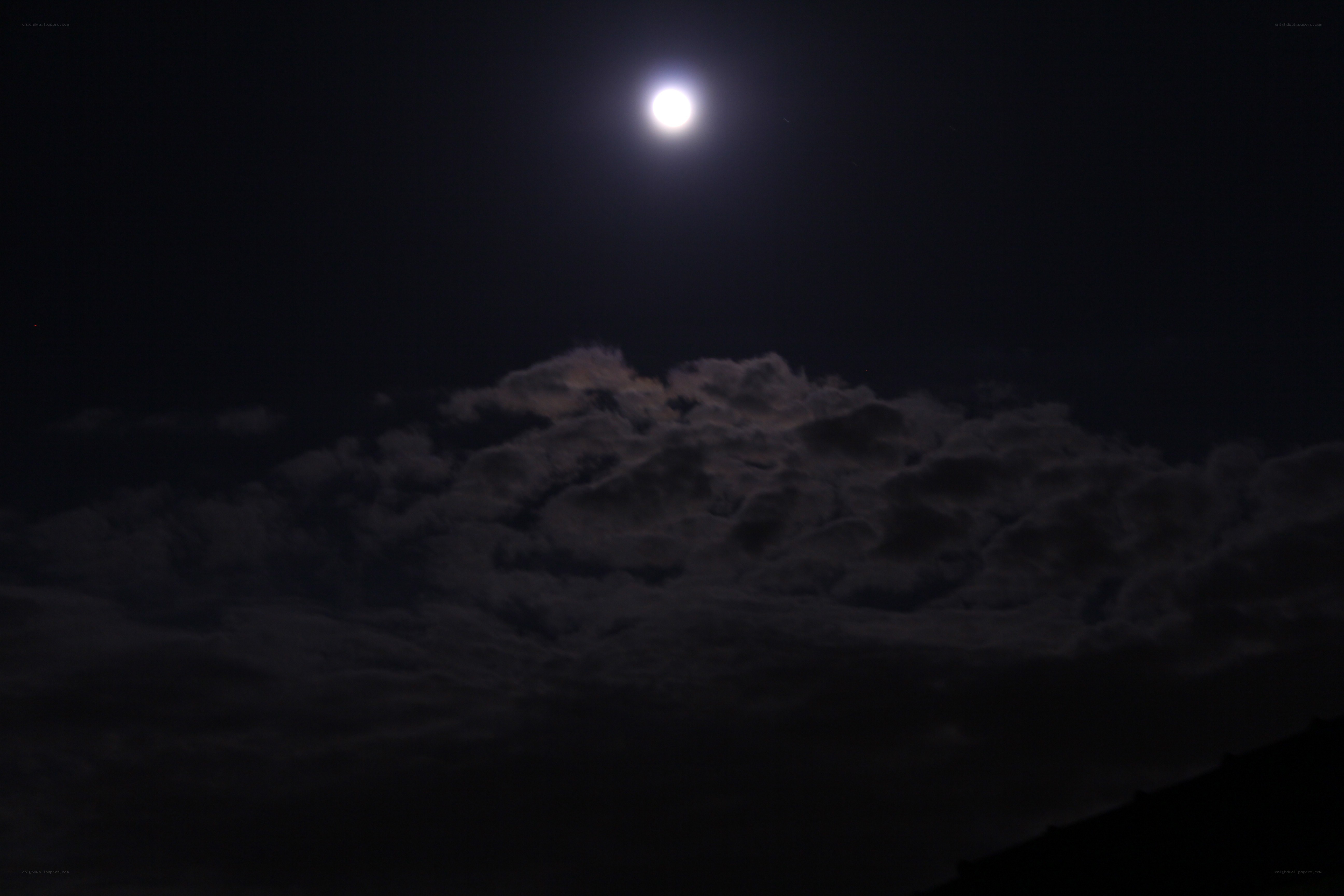 Moonlit night with clouds