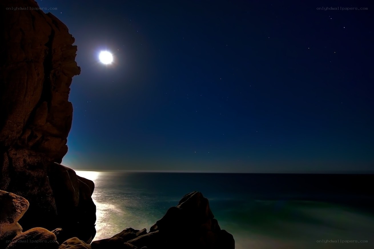 Moonlit ocean at night