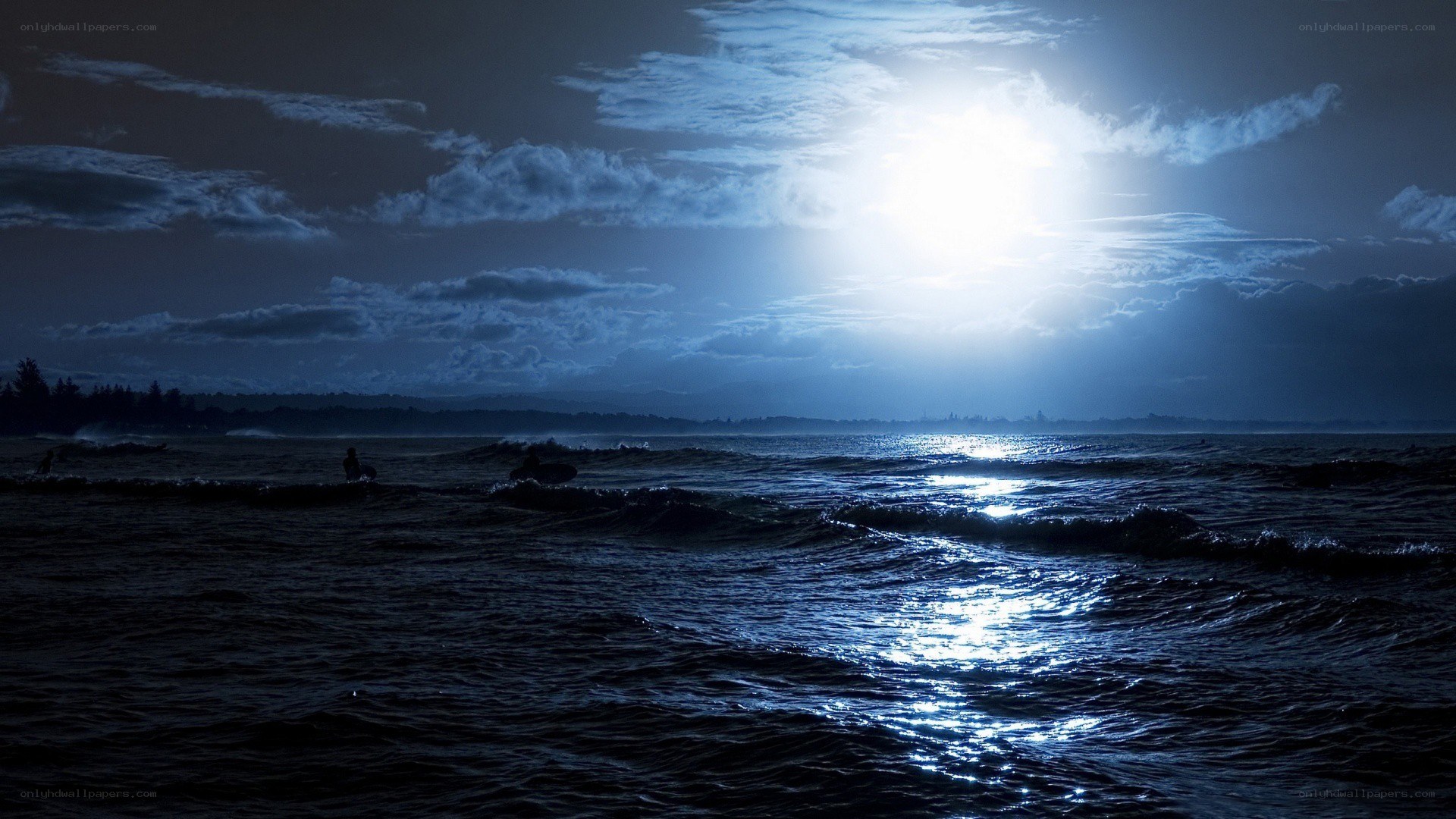 Moonlit ocean at night
