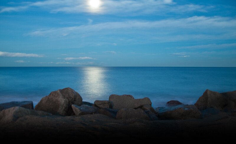 Moonlit Ocean at Night — Blue, Serene, Photograph, Rocks