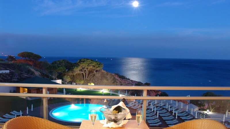 Moonlit poolside view at night