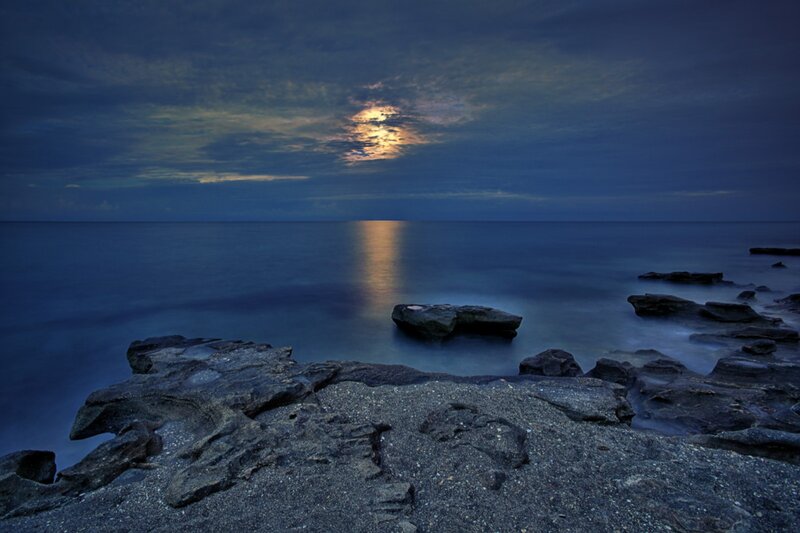 Moonlit Rocky Shoreline — Blue