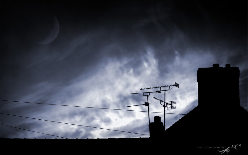 Moonlit rooftop scene