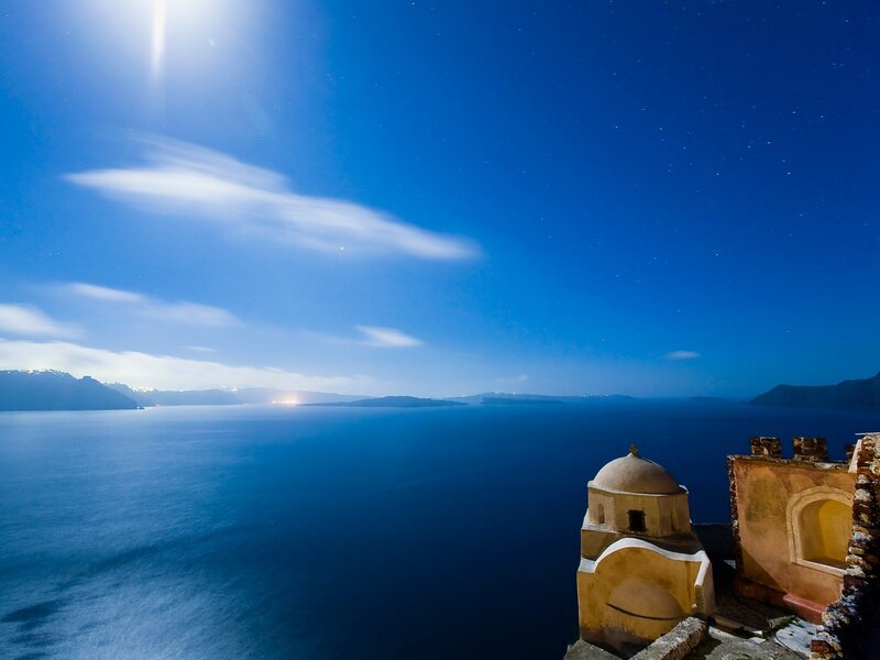 Moonlit sea with church dome