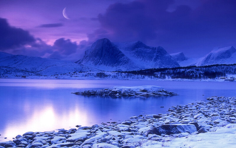 Moonlit snow-covered mountains
