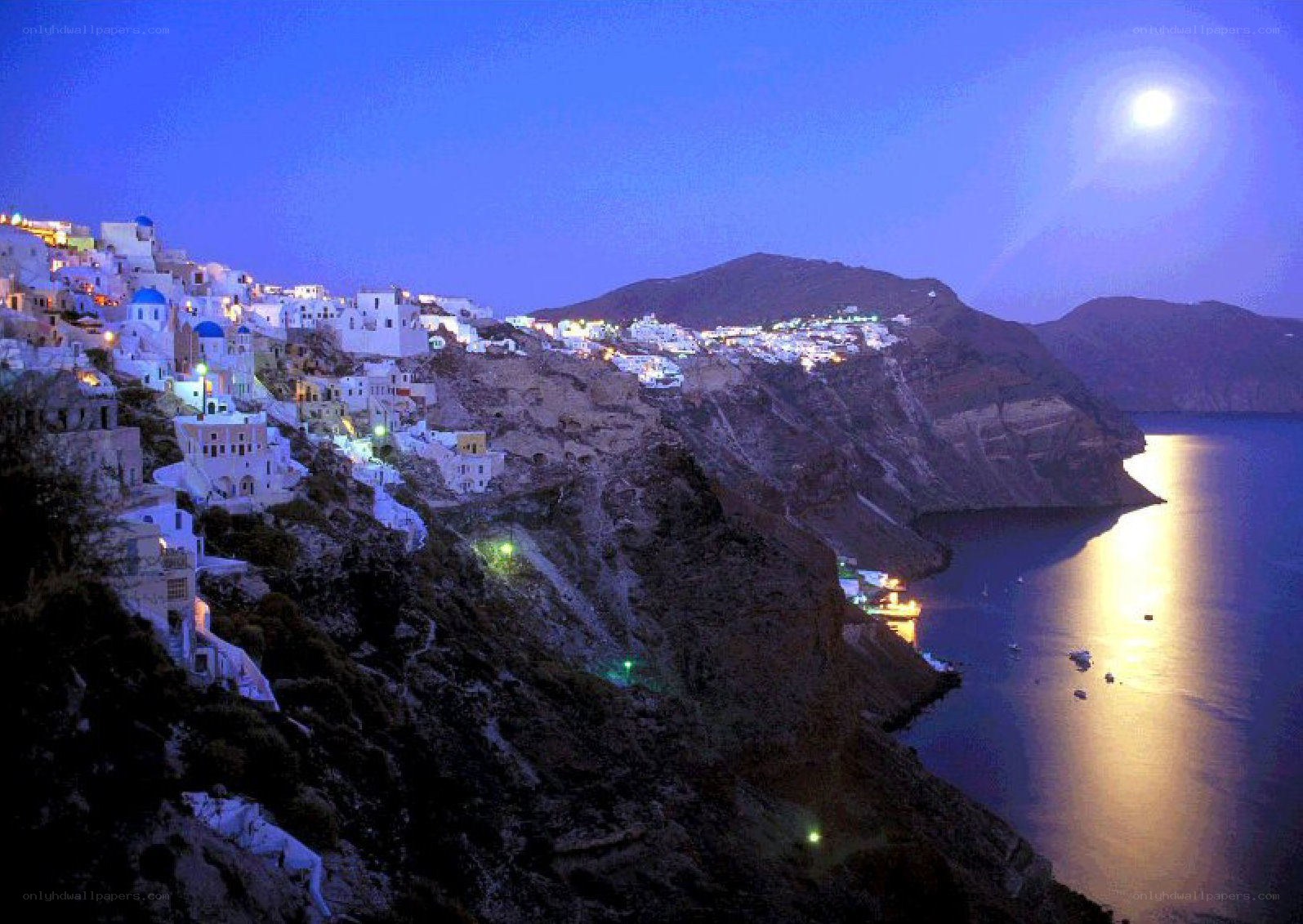 Moonlit village on a cliff