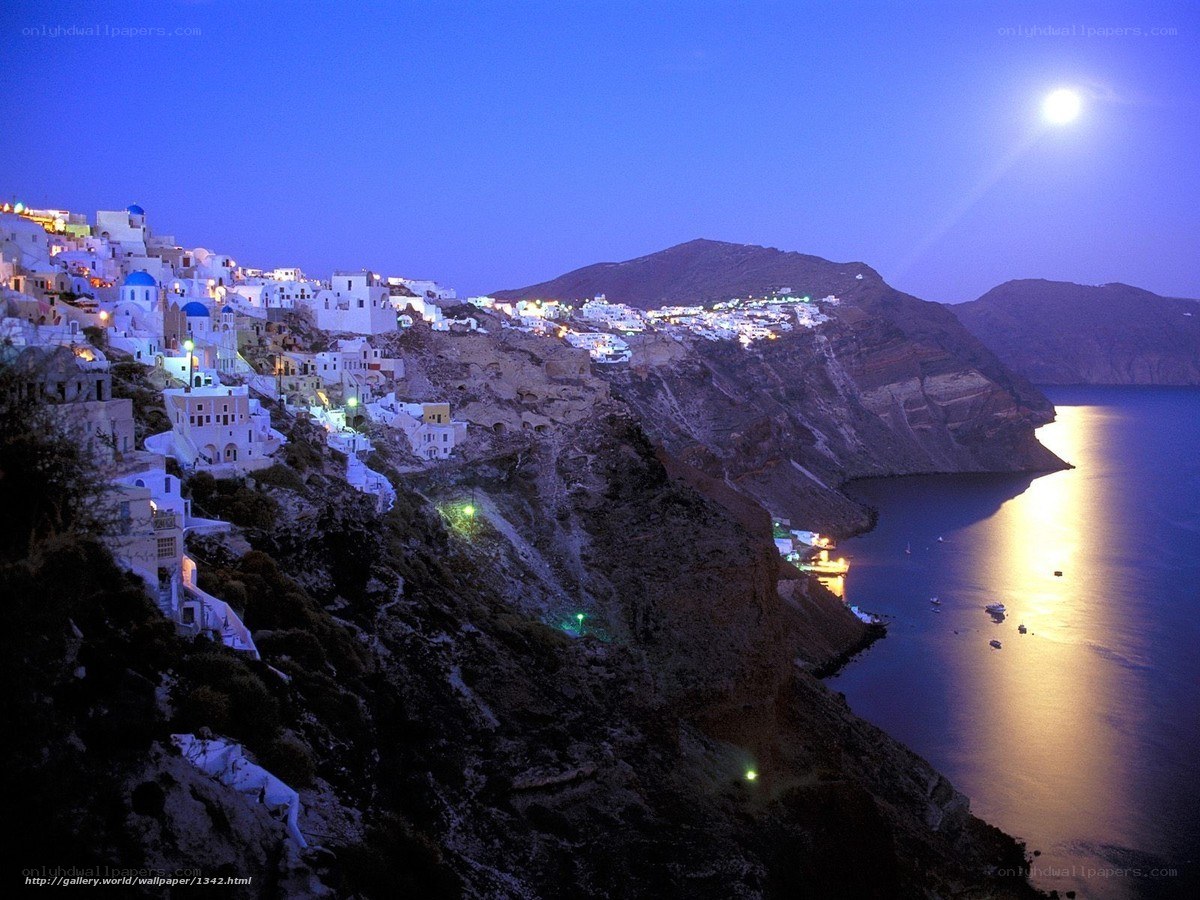 Moonlit village on cliffside