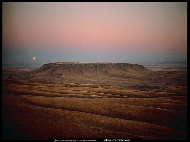 Moonrise over a butte
