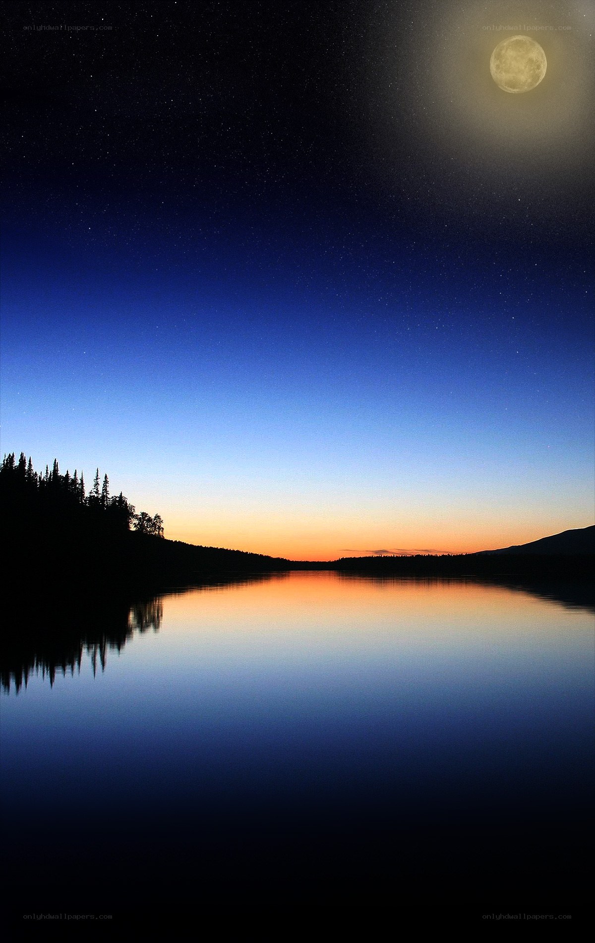 Moonrise over a calm lake