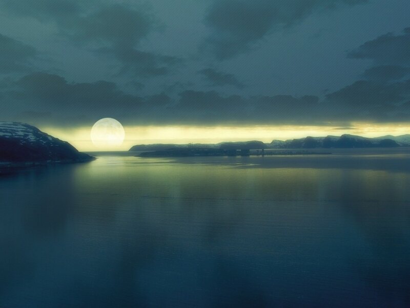 Moonrise over a fjord
