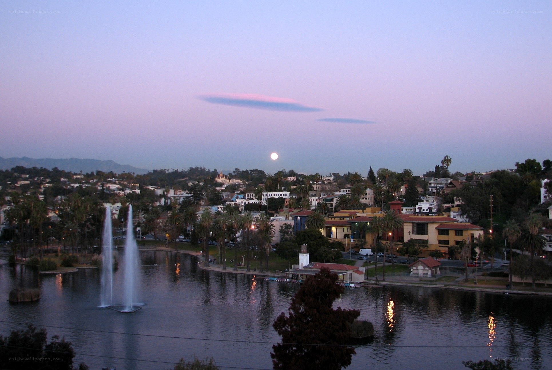 Moonrise over a lakeside town