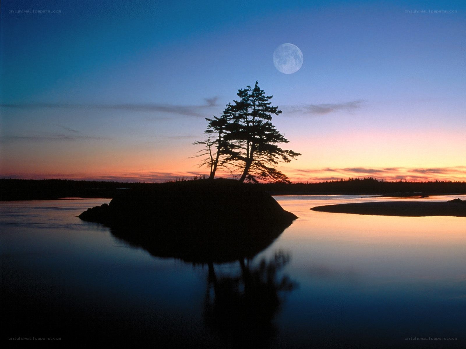 Moonrise over a lone island