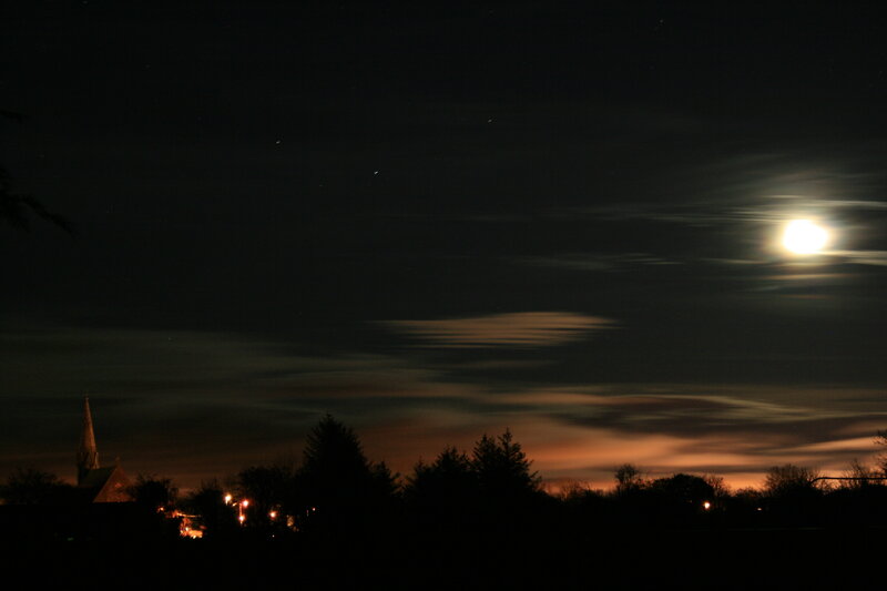 Moonrise over a quiet town