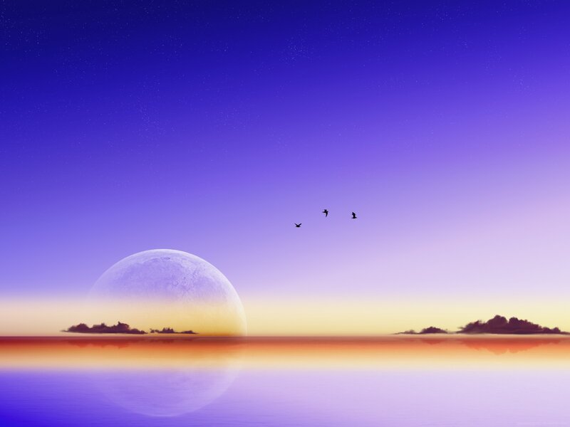 Moonrise over calm sea