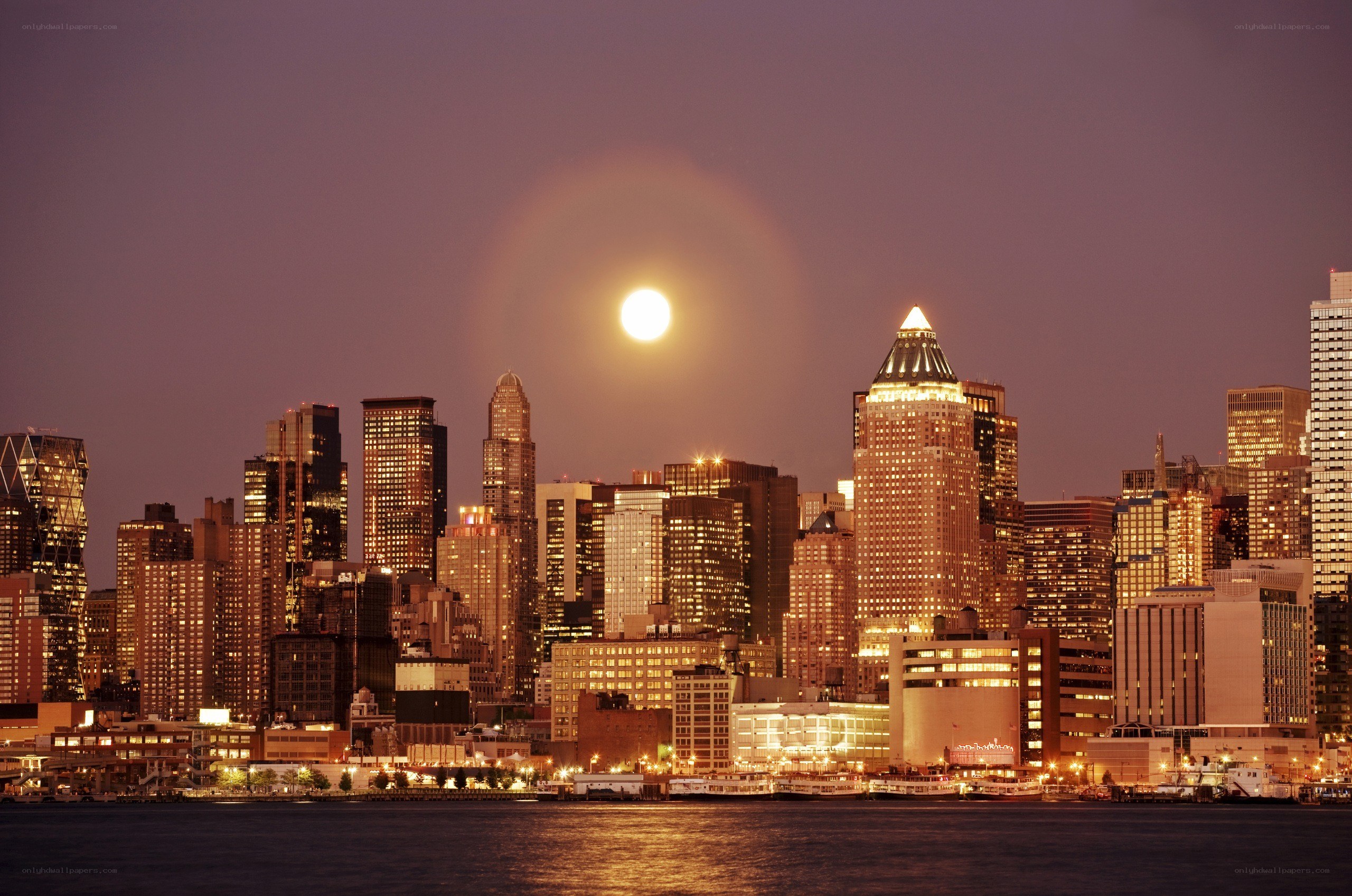 Moonrise over city skyline