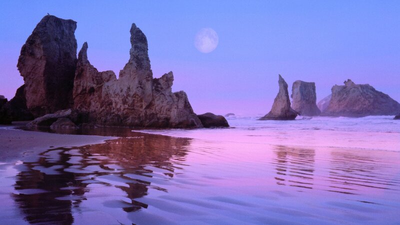 Moonrise over coastal rocks