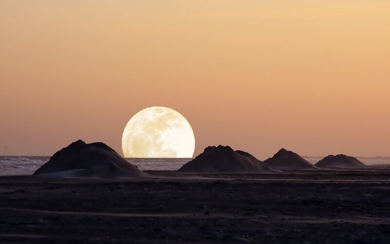 Moonrise over dunes