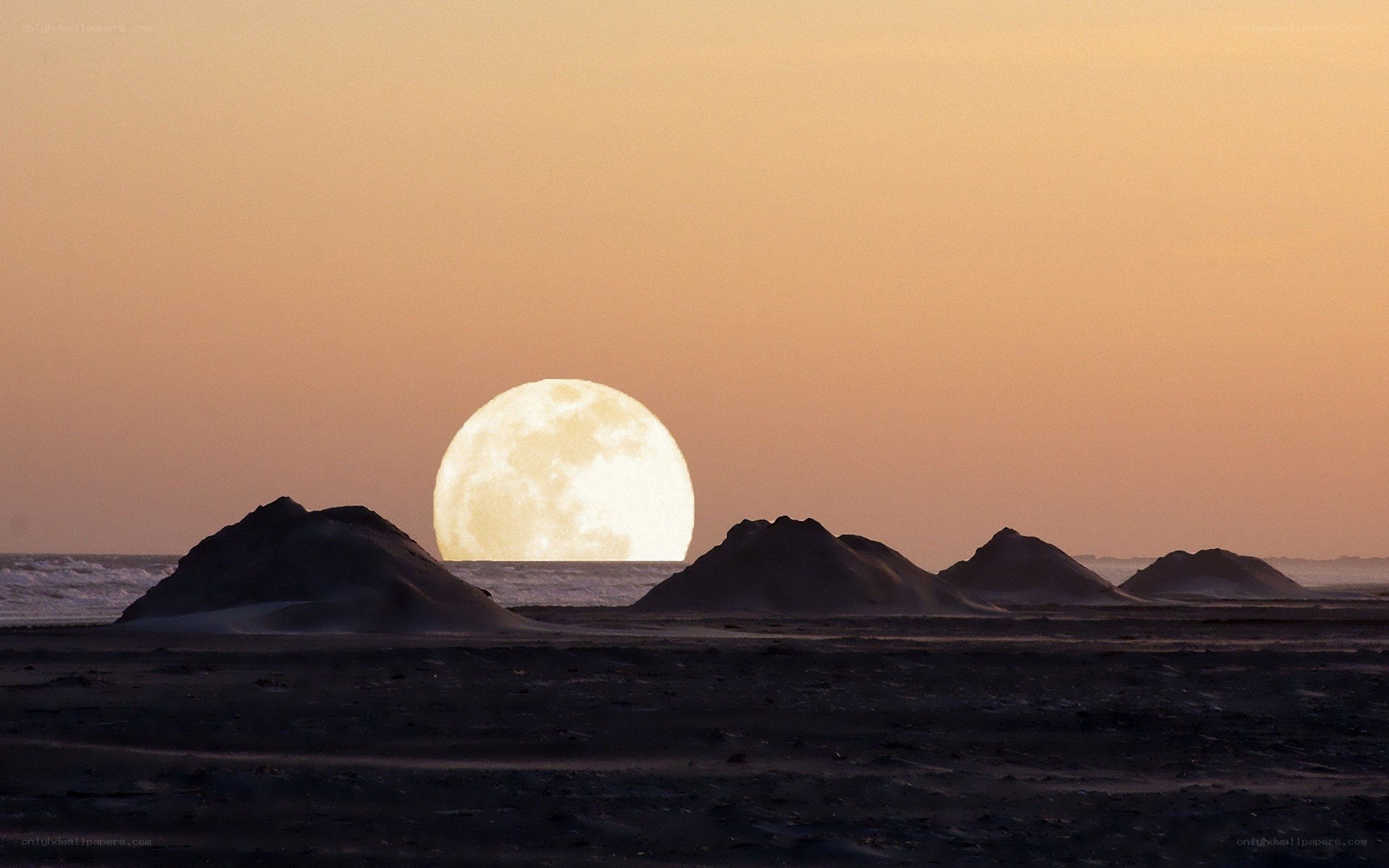 Moonrise over dunes