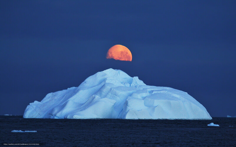 Moonrise over iceberg