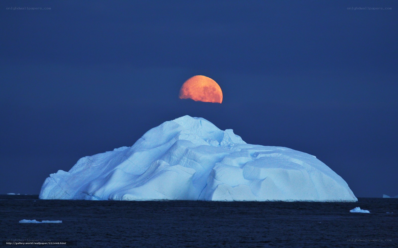 Moonrise over iceberg