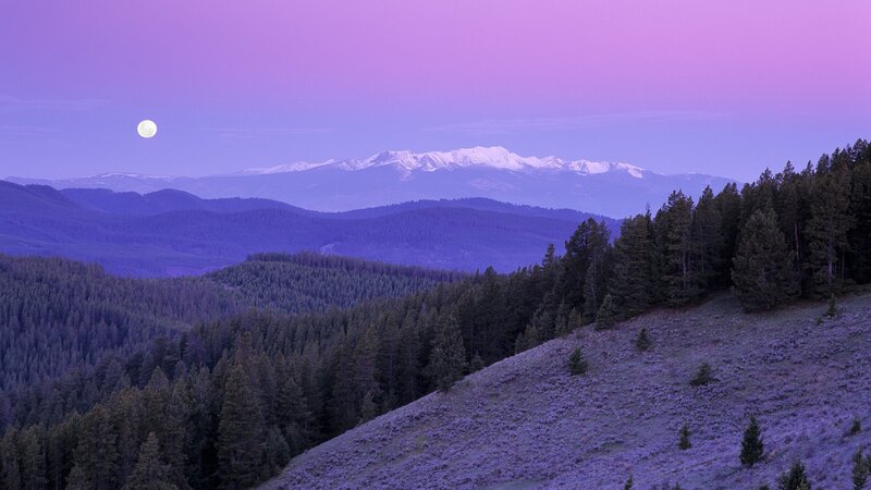 Moonrise over mountain range