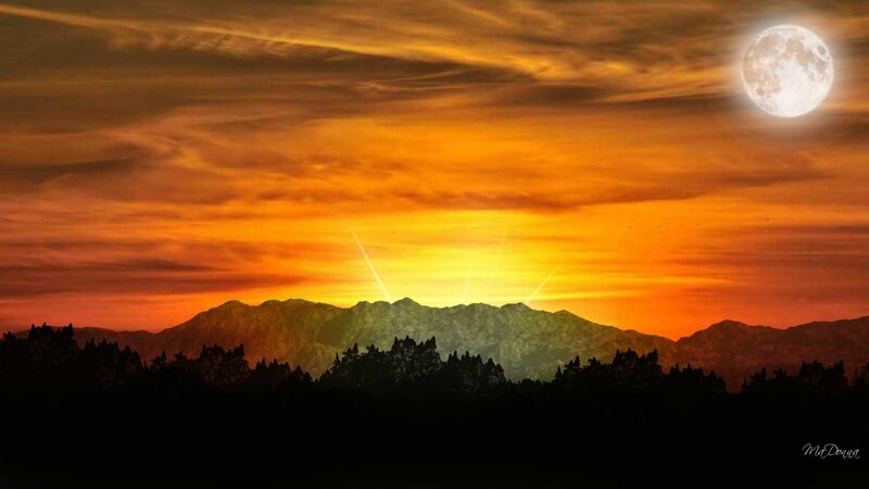 Moonrise over mountain silhouette