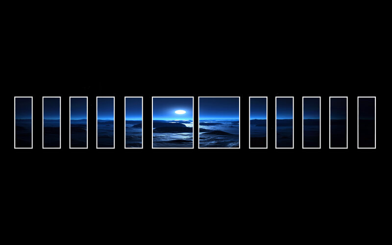 Moonrise over ocean landscape