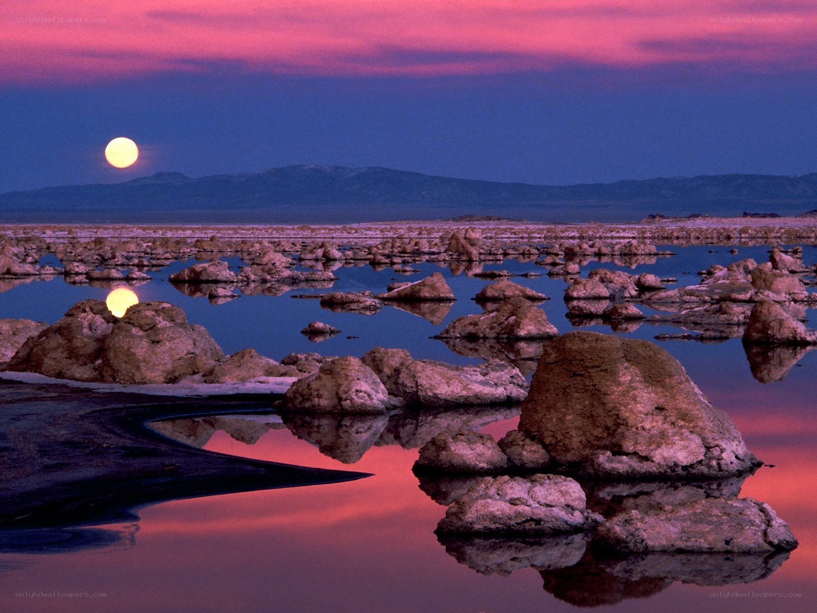 Moonrise over salt flats