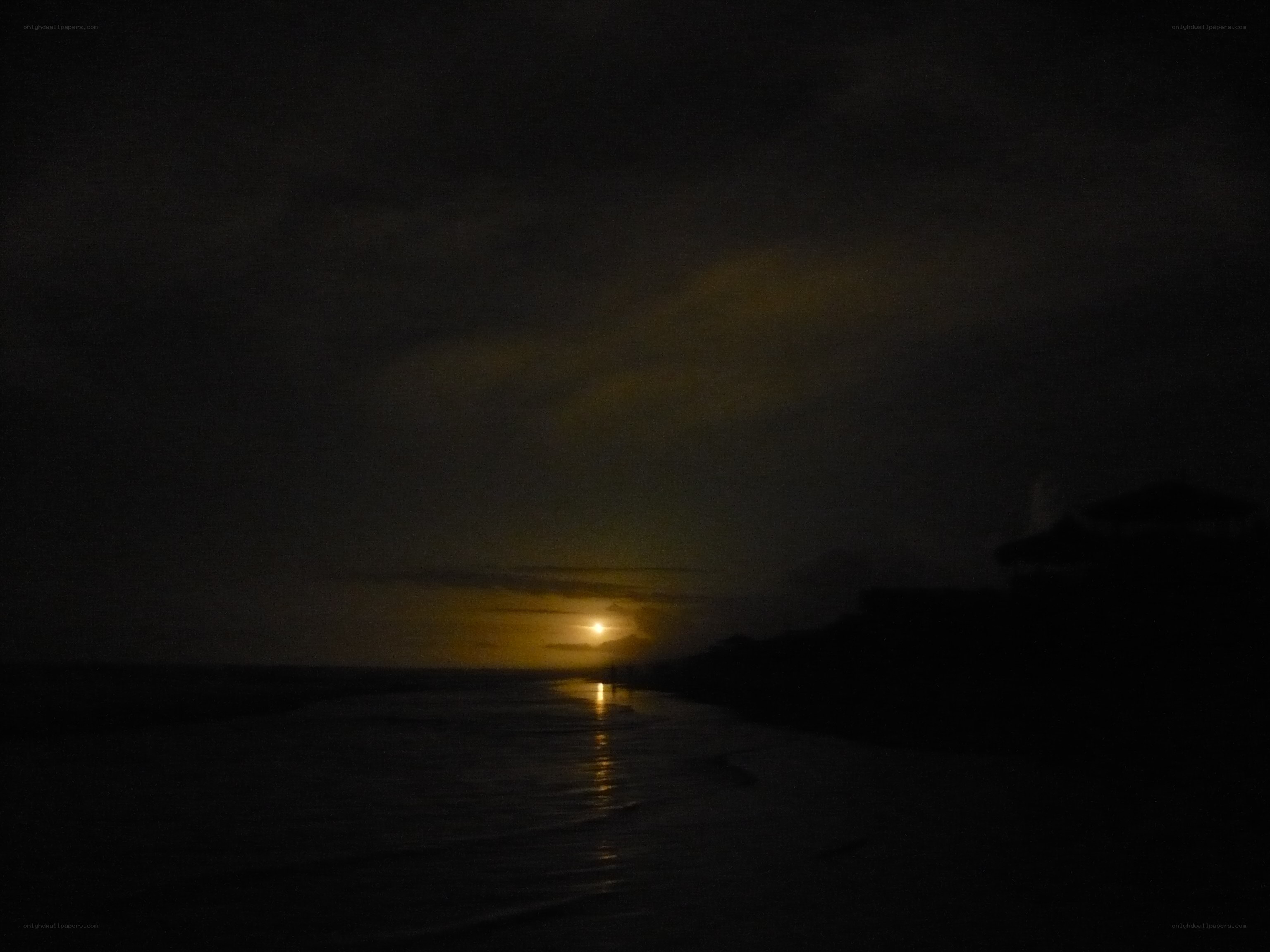 moonrise over the ocean