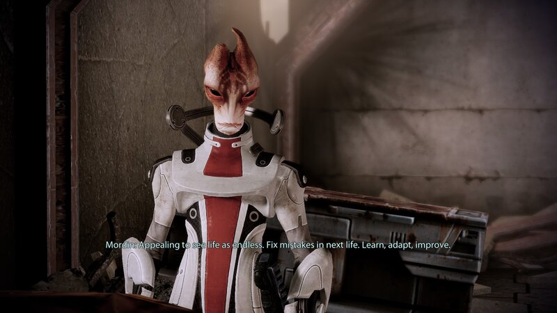 Mordin in a dimly lit room