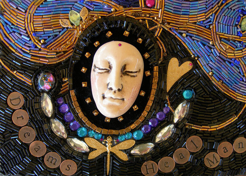 mosaic art with face and dragonfly