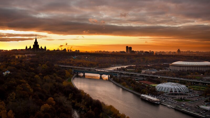 Moscow Skyline at Sunset — Orange, Dramatic, Photograph, River, Bridge, Stadium