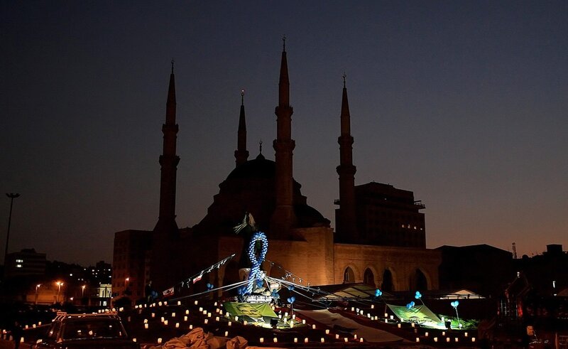 Mosque at dusk with memorial