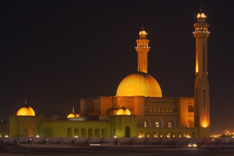 mosque at night with golden dome