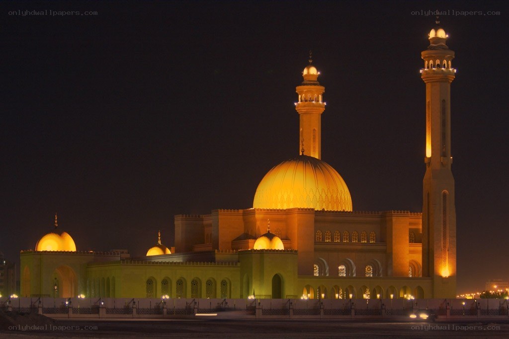 mosque at night with golden dome
