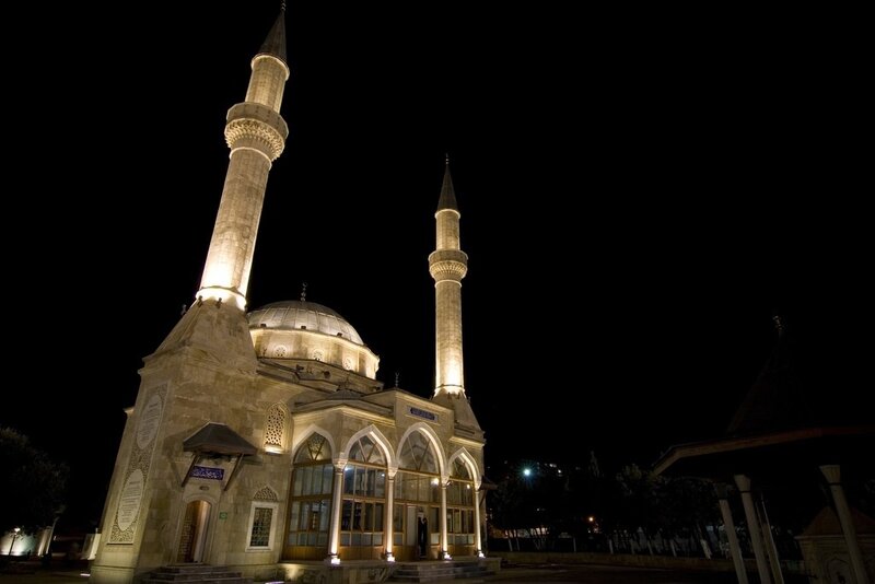 mosque at night with minarets