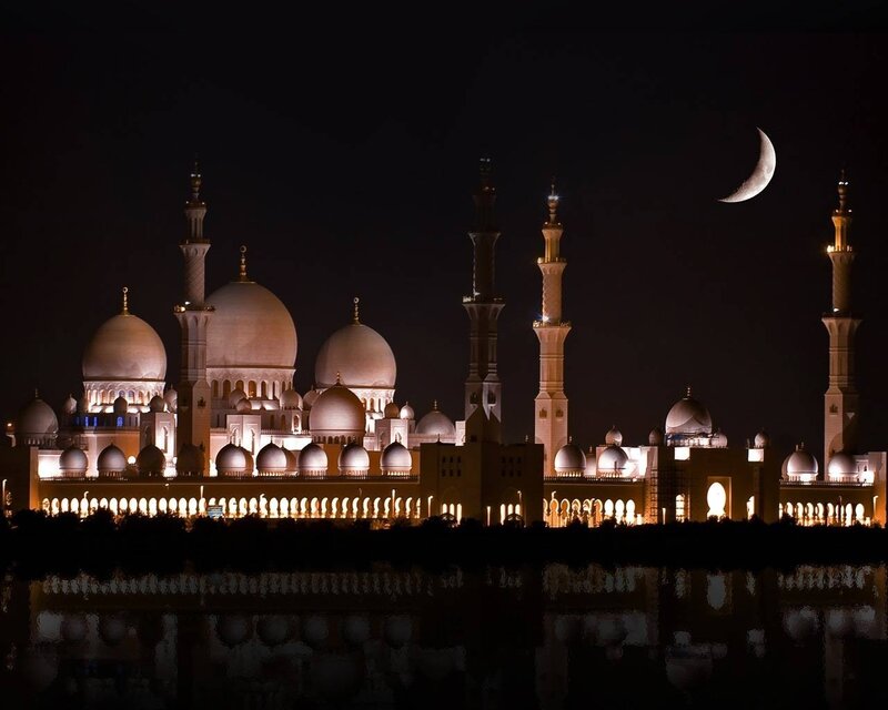 mosque at night with moon