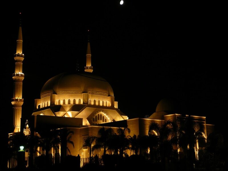 mosque at night with moon