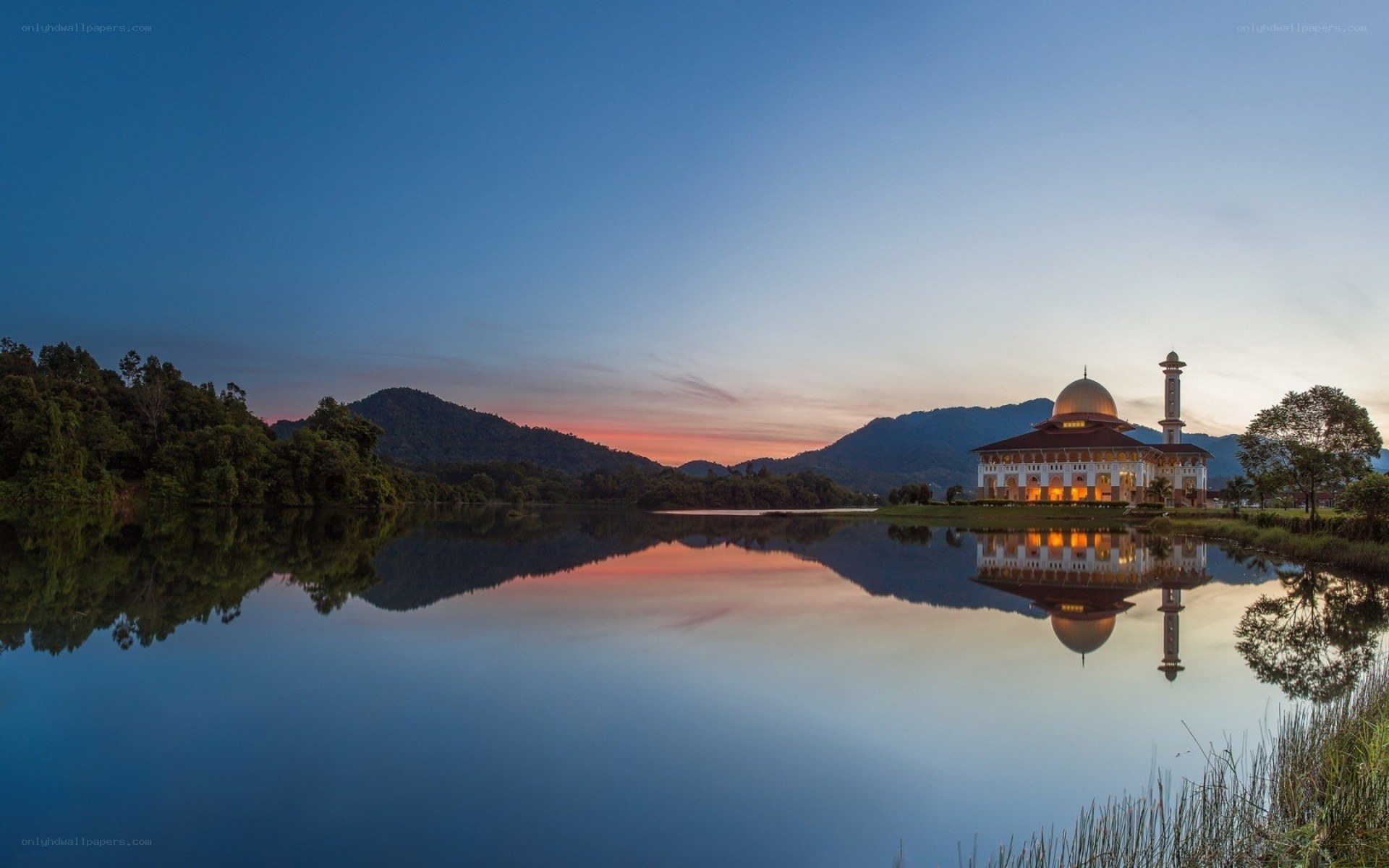Mosque at sunset by the lake