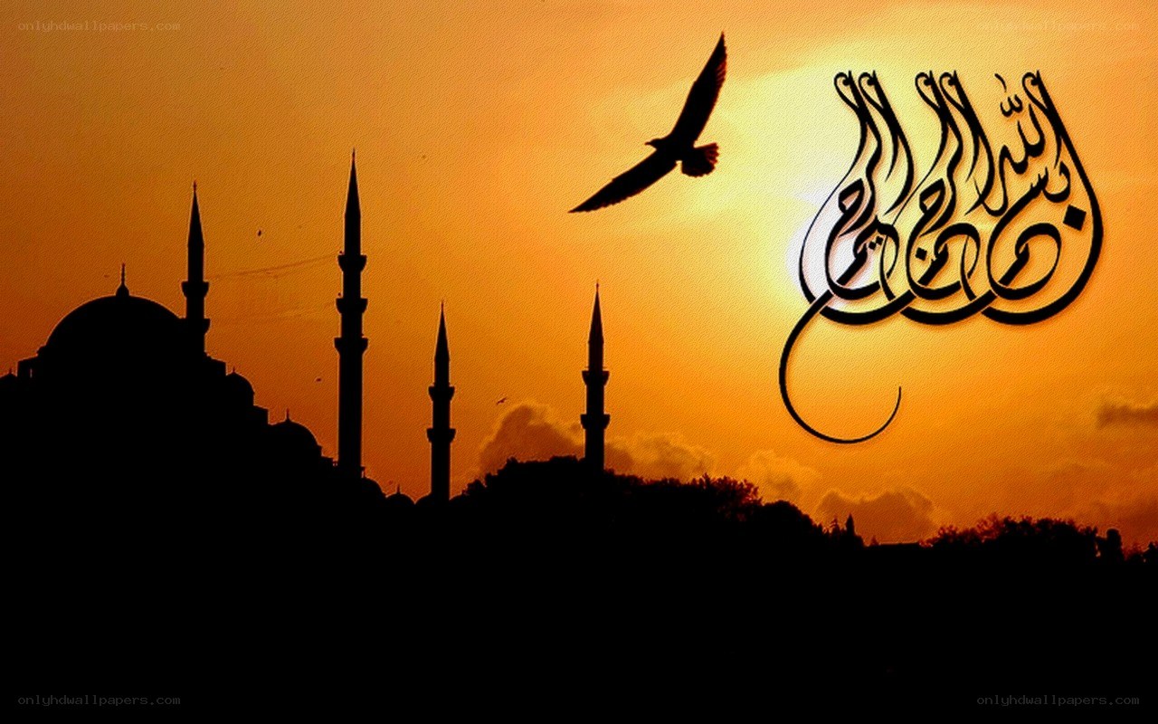 Mosque at sunset with Arabic calligraphy